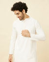 Pristine White Kurta Set with Embroidered Placket and Neckline image number 0